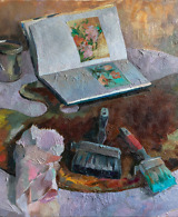 Still life painting with a book, brushes, a palette, and other artist tools