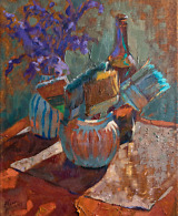 Still life painting with brushes, purple flowers and a glass bottle