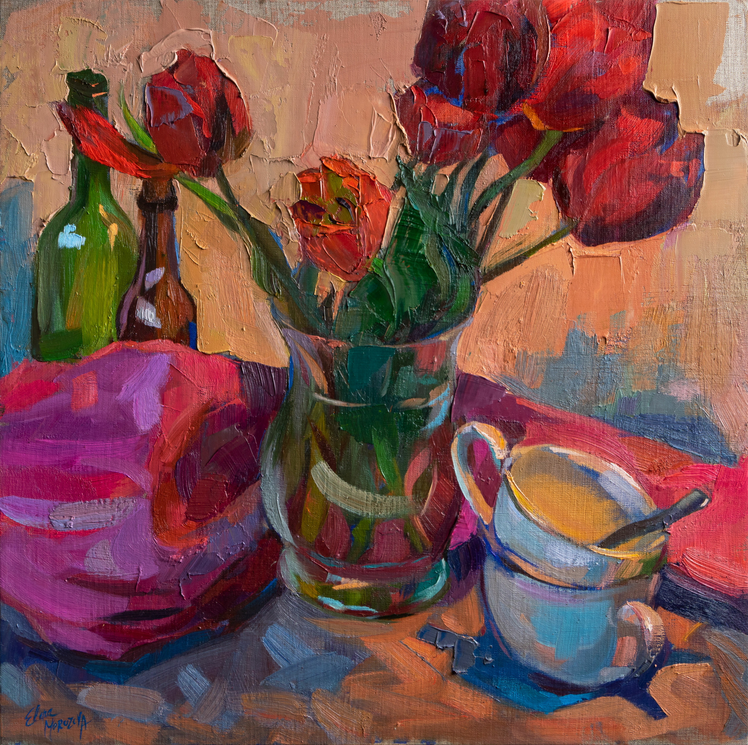 Still life painting with red tulips, bottles, teacups and a pink drapery